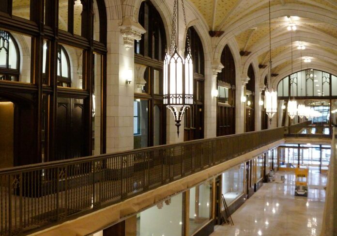 Grand hallway with high ceilings and lights