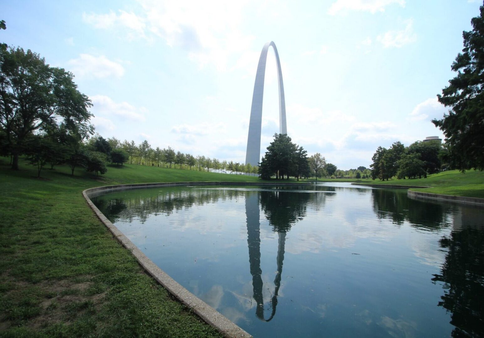 Iconic arch mirrored in calm water