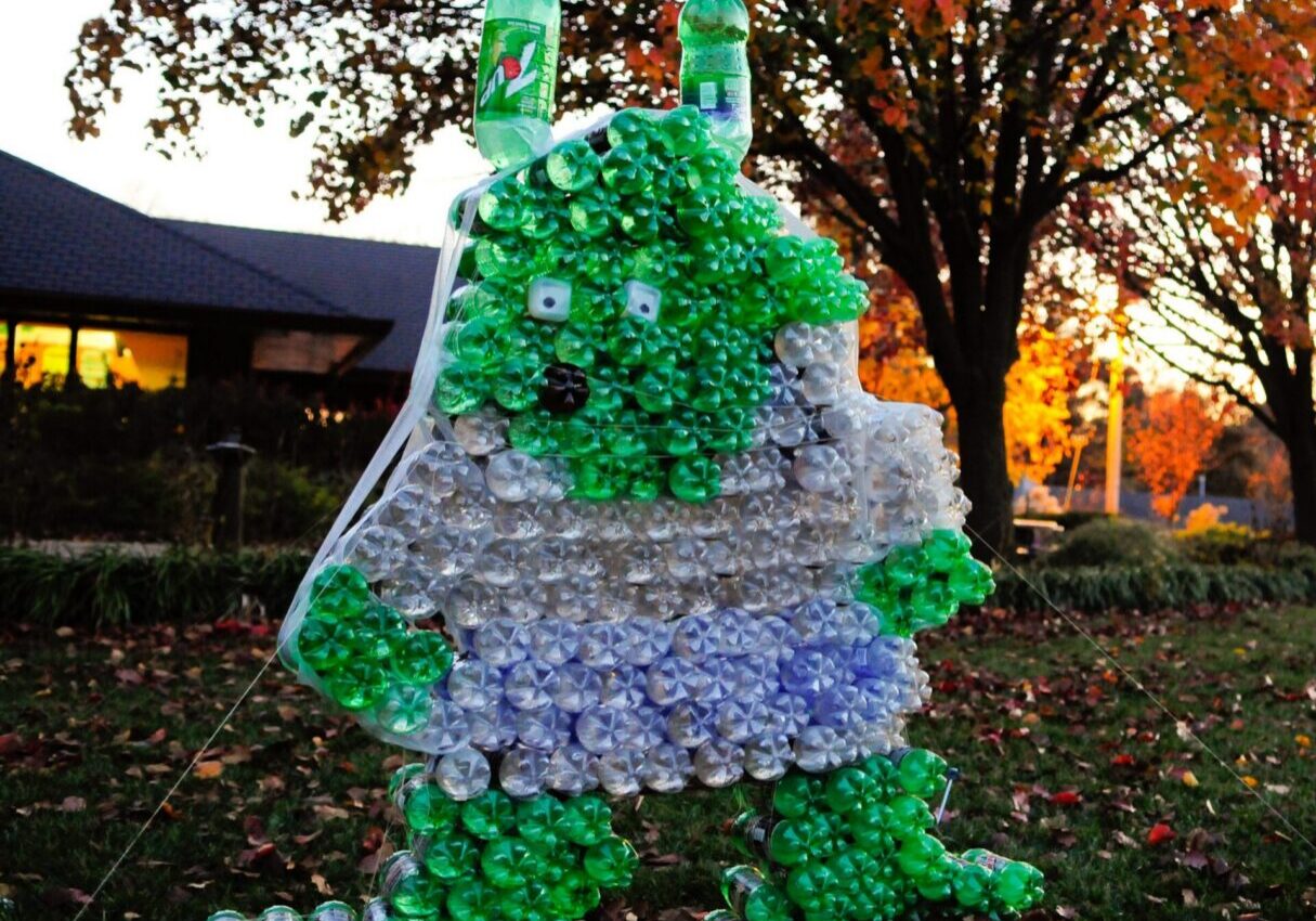 Dinosaur figure crafted with recycled materials