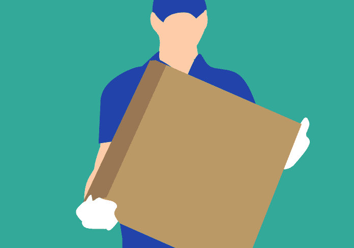 Delivery person carrying a large box