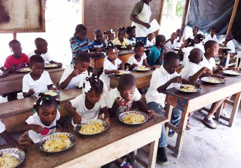 Children eating lunch in classroom setting