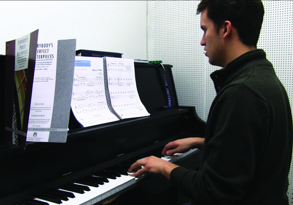 Pianist practicing in music room