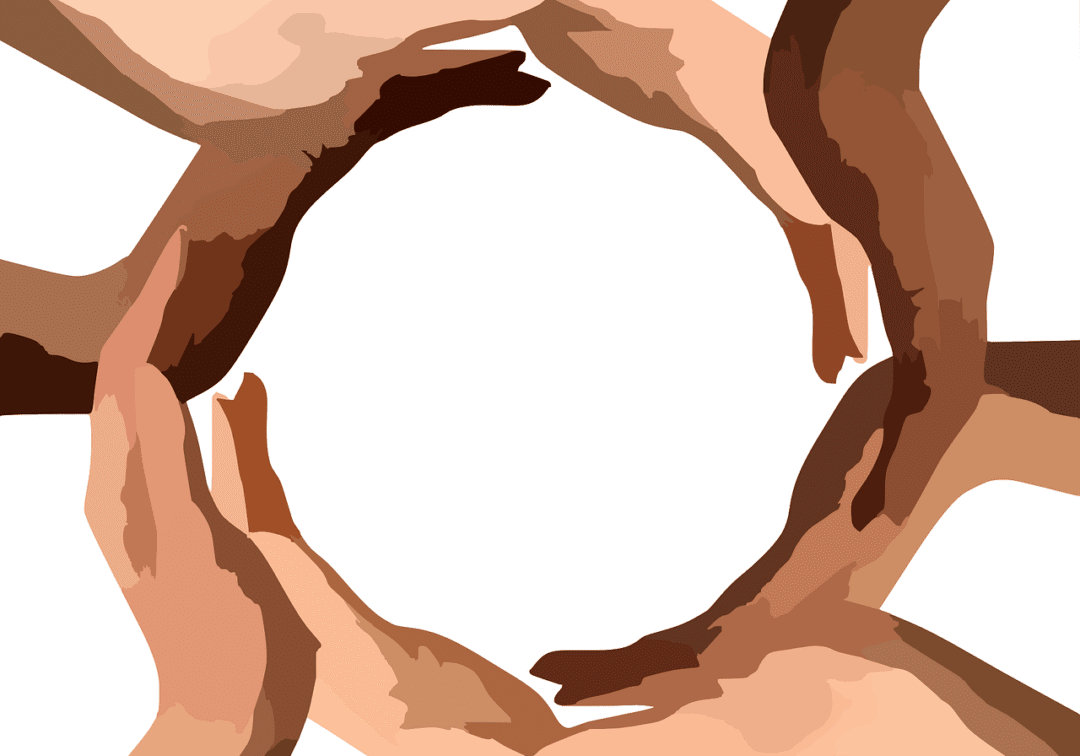 Multicultural hands creating a unified shape