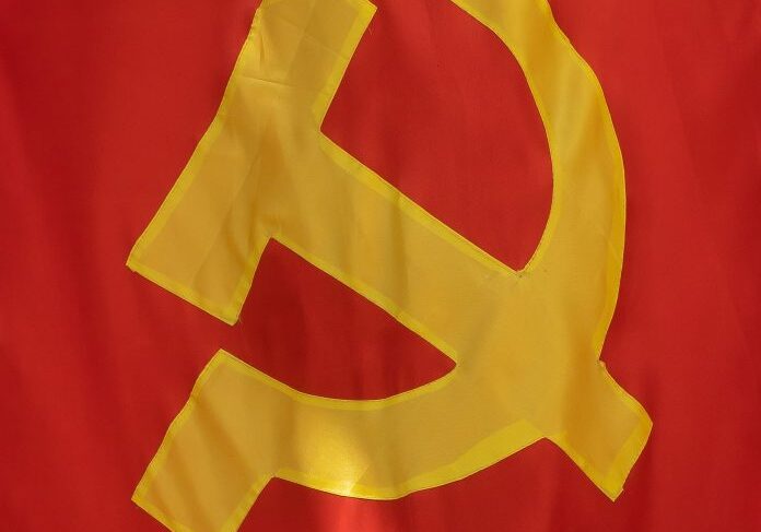 Communist symbol on a red background
