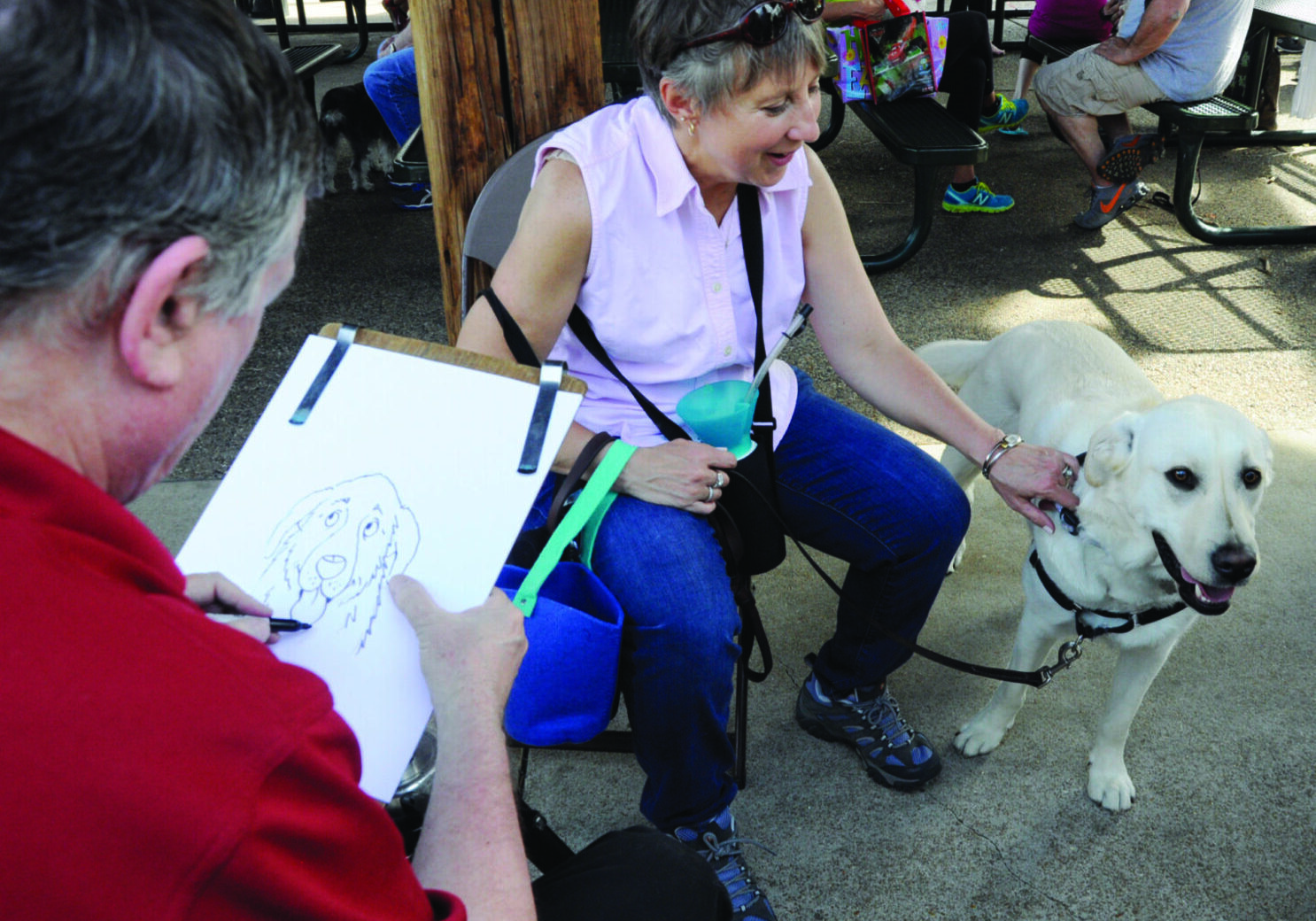 Outdoor sketch session of woman and dog