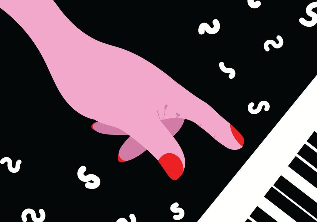 Pink hand pointing at piano keys