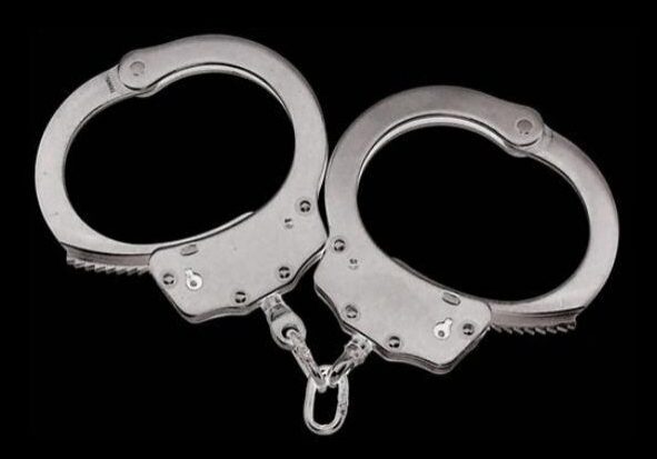 Metal handcuffs with chain link