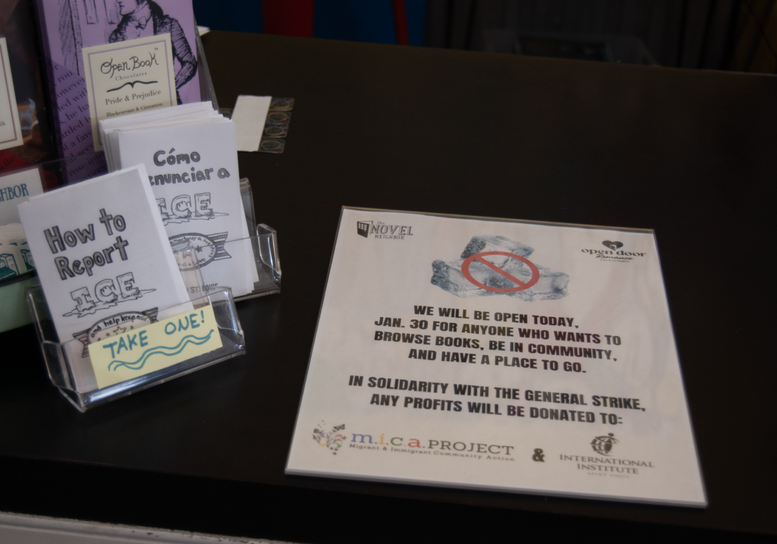The Novel Neighbor displays zines about reporting ICE and keeping others in the community safe at their front counter. These zines were created by Megan Piontkowski and are available for anybody to view and print here. Photo by Ryann Barnash