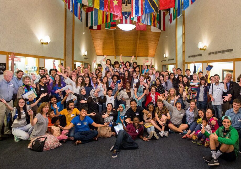 Large gathering in a hall setting