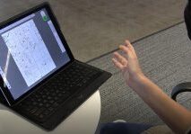 Person using tablet for document viewing