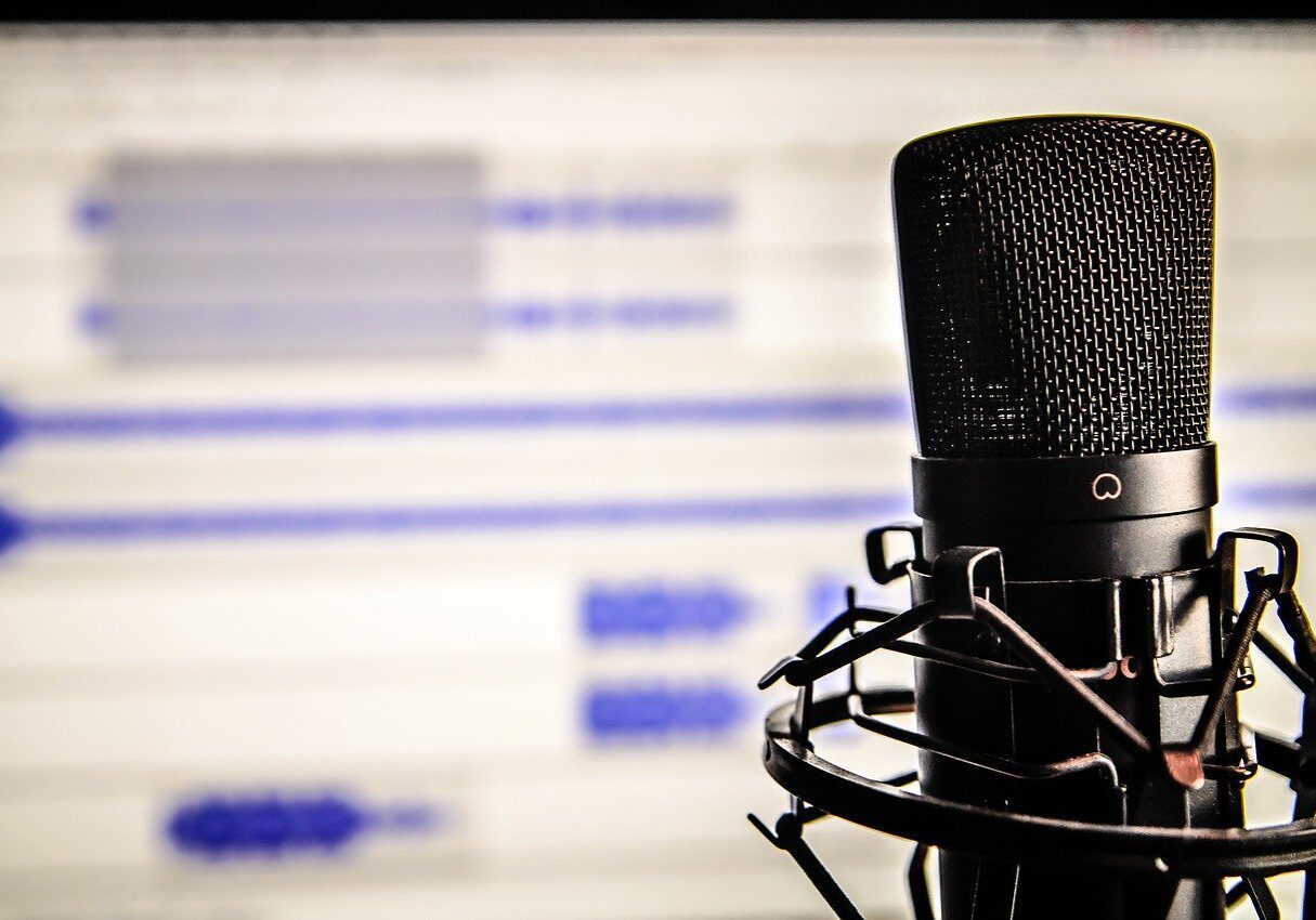 Studio microphone in front of screen
