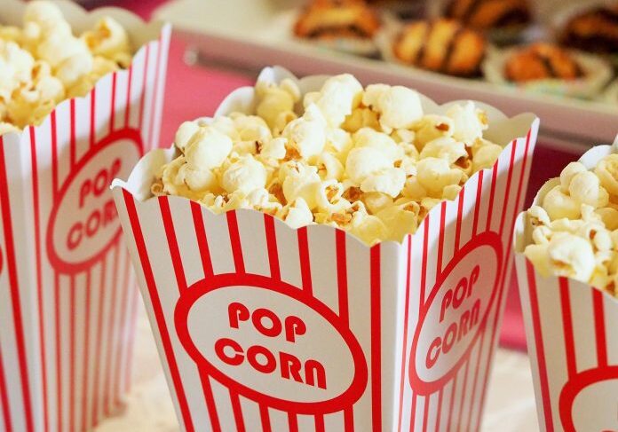 Popcorn in red-striped containers