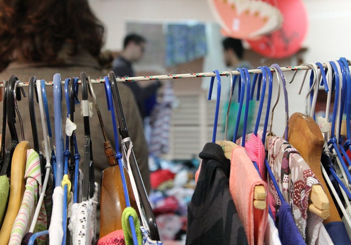 Assorted garments in a busy shop