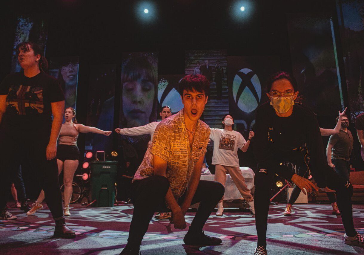 Theatrical performance with energetic dancers