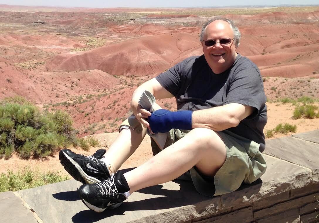 Smiling man enjoying desert view