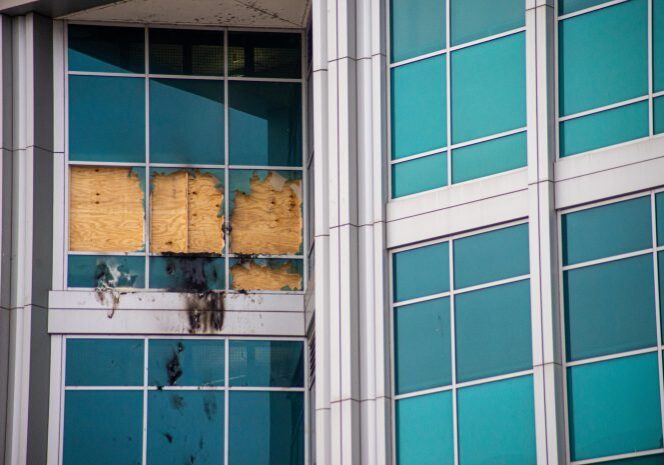 Office building with damaged window panels