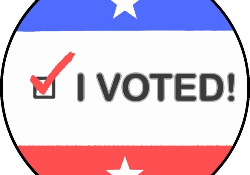 Red, white, blue voting badge