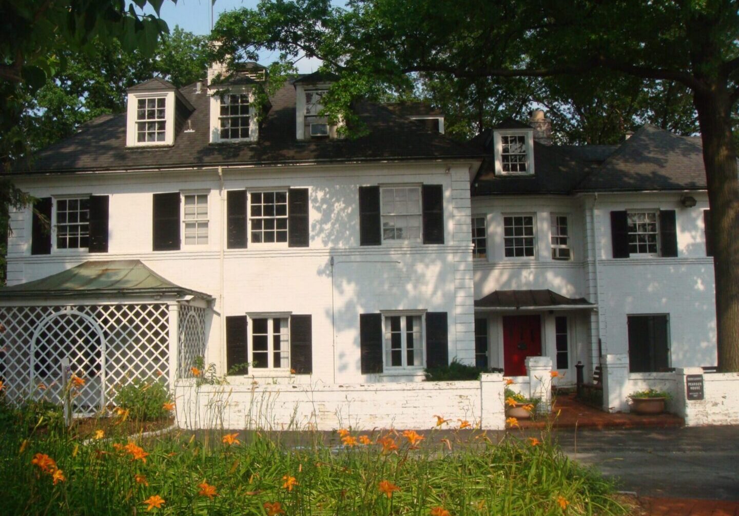 Traditional house with black shutters