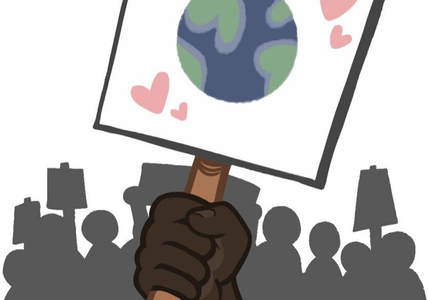 Hand holding Earth protest sign