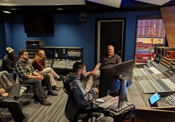 Recording studio discussion with group