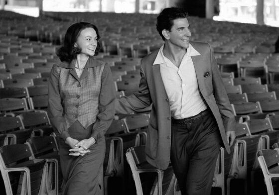 Vintage couple smiling in empty theater